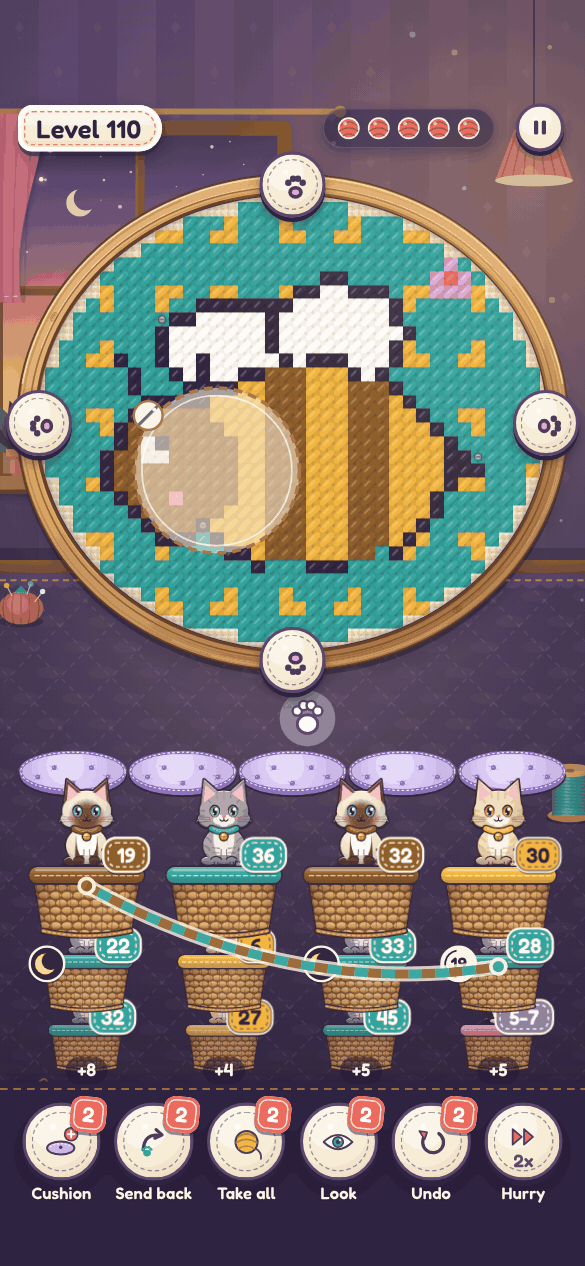 Level 110 brings the appliqué: a cloth patch covers part of the picture until the kitten under the needle goes home.